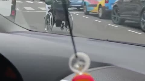 Man Tears Through City in His Wheelchair