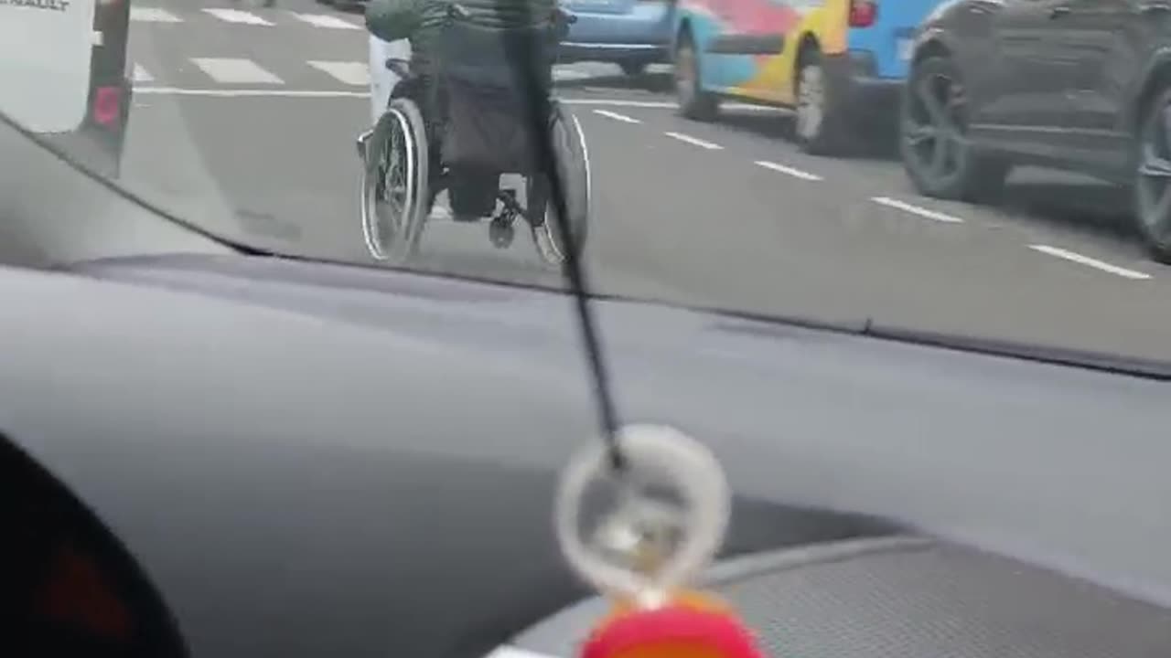 Man Tears Through City in His Wheelchair