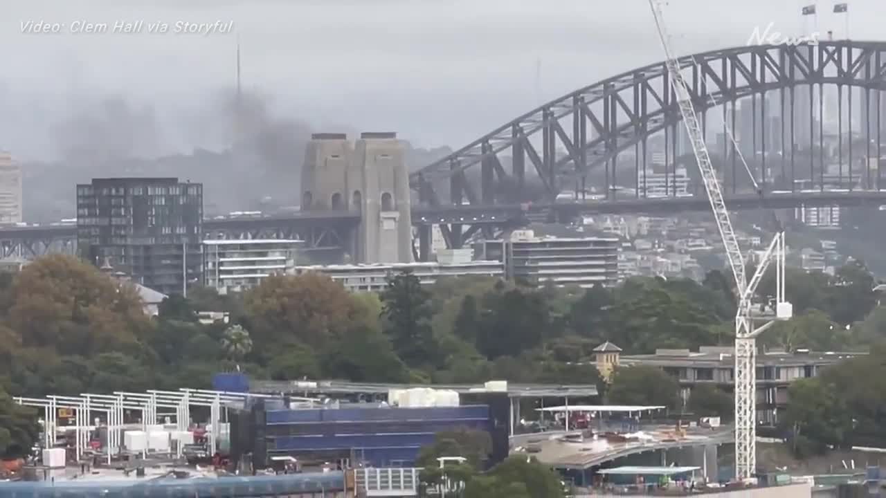 Car in flames on Sydney Harbour Bridge after multi-vehicle crash