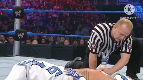 See how badly Batista DESTROYED Rey Mysterio to the point where the referee stopped the match!