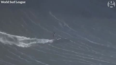 Giant wave slams into British surfer Andrew Cotton causing huge wipeout