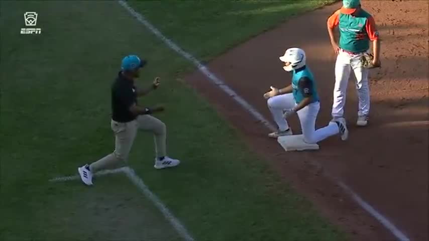 Coach Celebrates Too Much with His Player; Player Then Gets Tagged Out