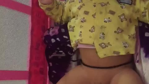 Cute Baby playing in bed