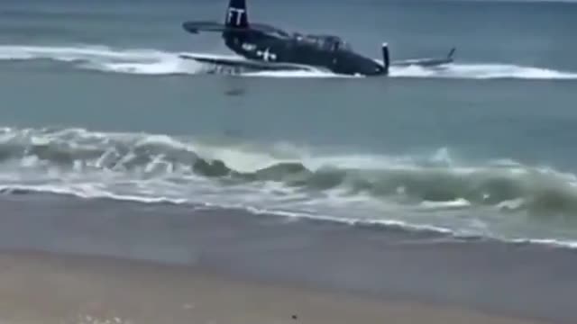 Huge plane crash by the shore.