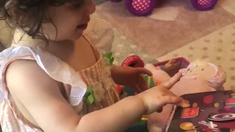 Playing and reading in her room