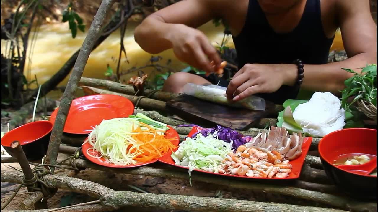 Fresh Shrimp Vegetable Spring Roll eating with Hot Chili Sauce - Vegetable Salad Spring Roll