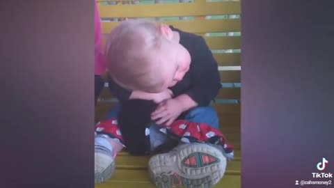 Watch the best video of a baby cradling a cat madly