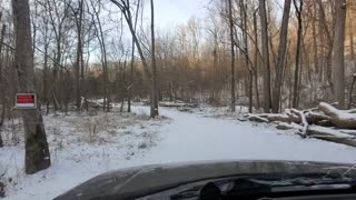 Splitting wood in the snow. First time up the driveway in the snow!