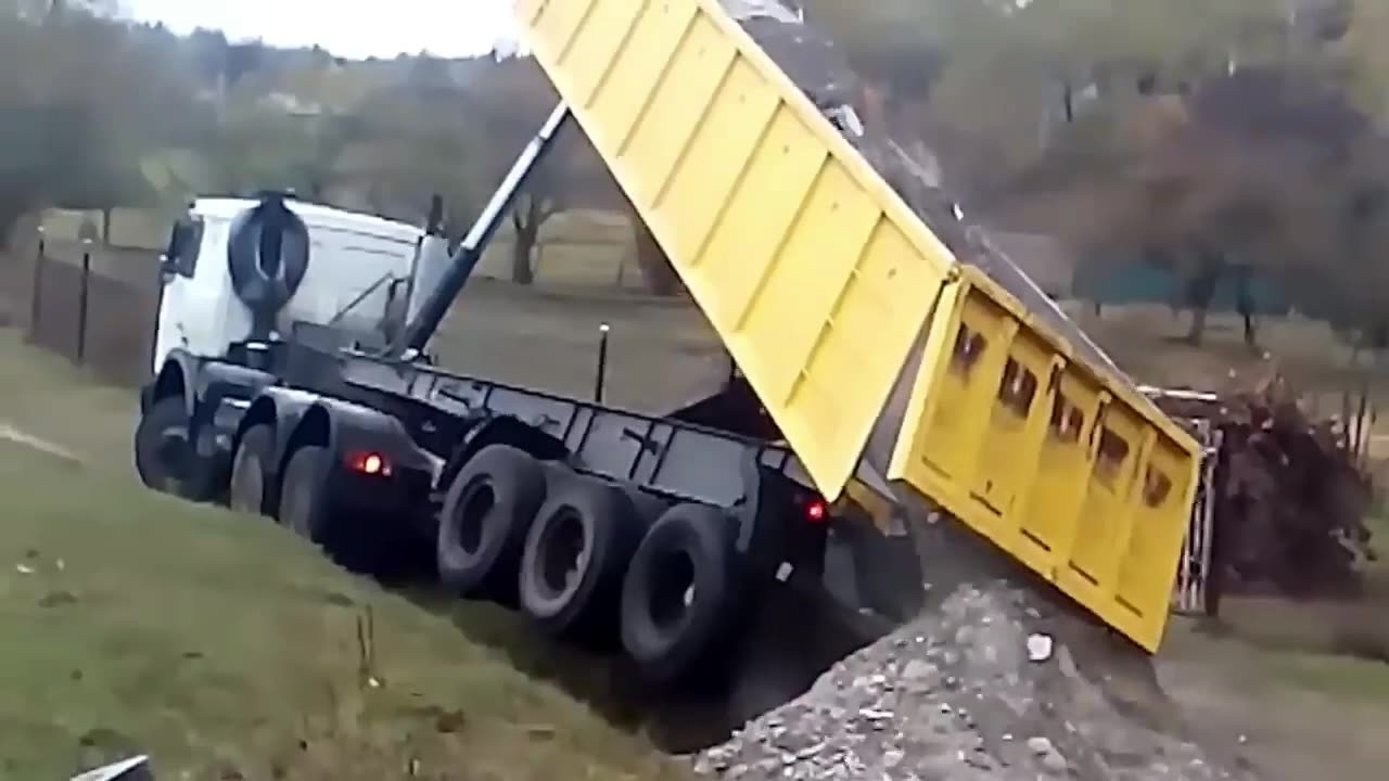 Dump Truck Tips over in Russia