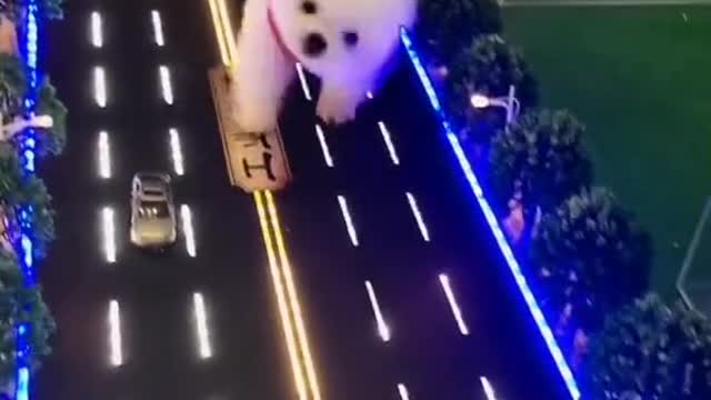 Here comes Godzilla. It's so cute