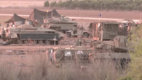 Israeli ground forces gather near Gaza border