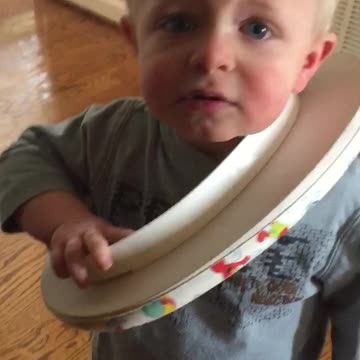 Toddler Somehow Gets Himself Stuck in Toilet Seat
