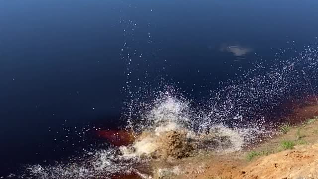 Man Barely Makes Leap into Dirty Pond