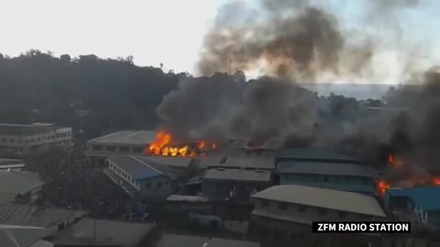 Solomon Island Lockdown rioter set fire to government building.