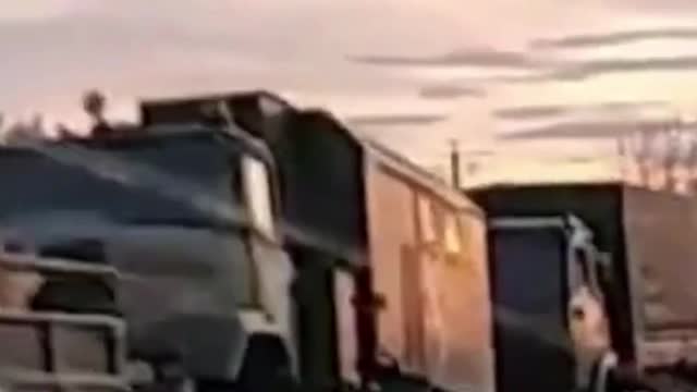 A Column Of Russian Military Vehicles Moving Towards Russia