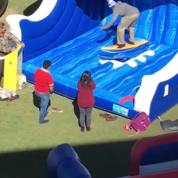 Blue beanie falls off yellow surfboard blue wave machine