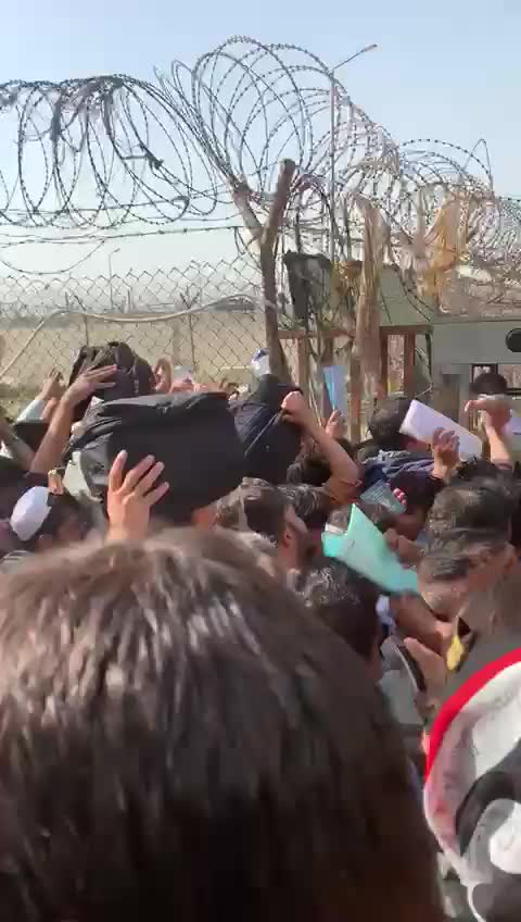 EMOTIONAL Video Shows Afghans Saving Children First for Fears of Taliban