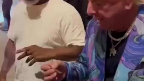 The Nature Boy Ric Flair smoking with Mike Tyson