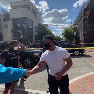 Joe Biden poses with Black Lives Matter protester in Wilmington Delaware