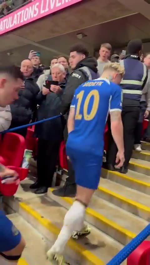 Furious Enzo Fernandez stares down a Liverpool fan