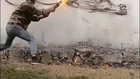Drawing with a burning torch