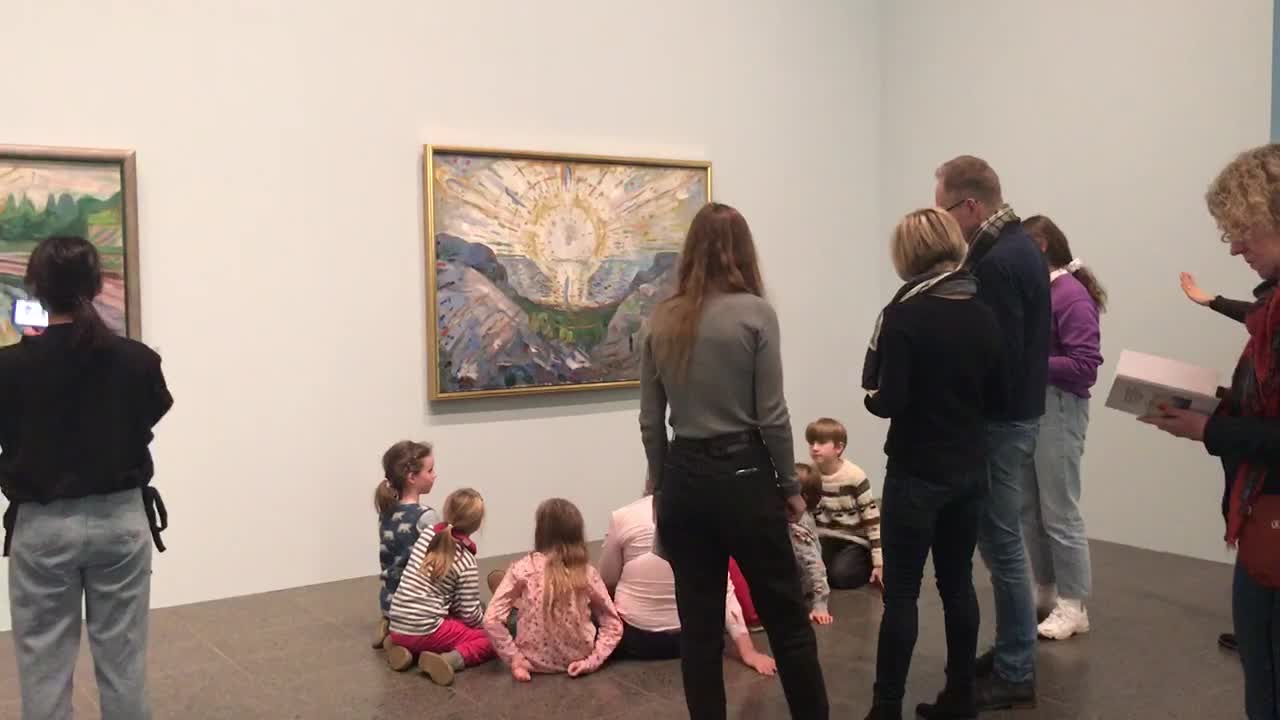 Children are learning by looking at pictures.