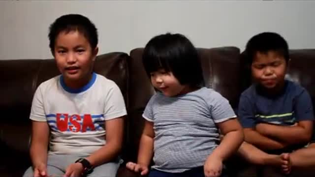 Chinese children singing 'Jesus loves me'