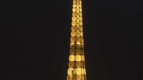 Moon rising over the Eiffel tower