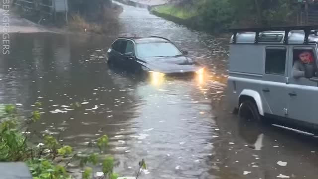 Vehicles vs Flooded Road