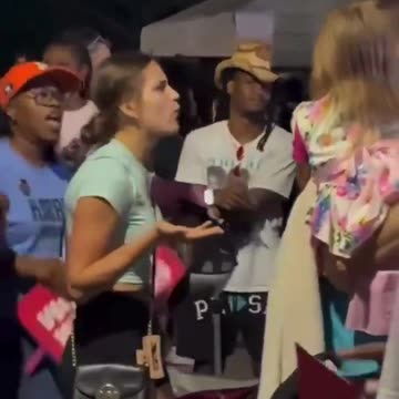 Kamala Harris supporter screams in the face of a child...