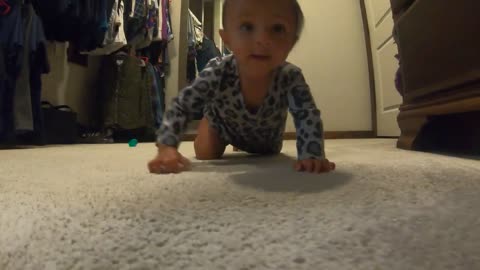 Cute Baby Crawling in Closet