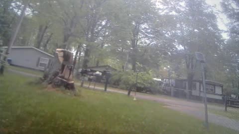 orange ball floats across front yard