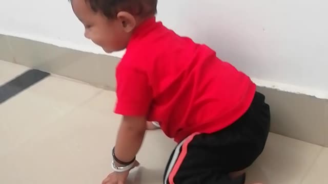 Baby boy playing video