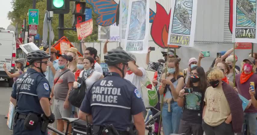 'Which Side Are You On?': Climate Protestors Block Traffic And Face Arrest Outside Capitol