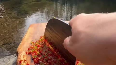 Cooking beef rib in nature