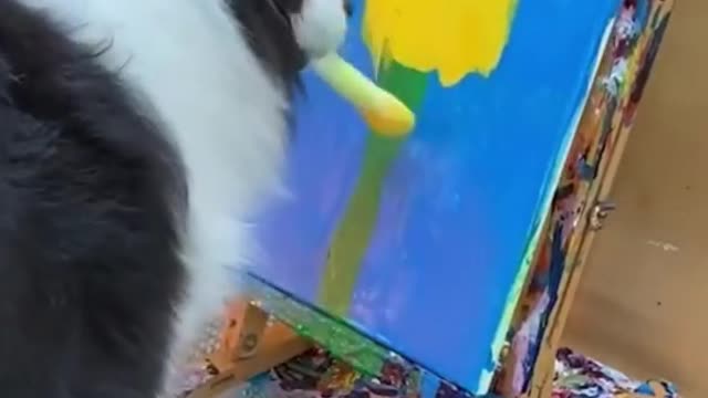 Incredibly Talented Aussie Dog Paints A Flower Onto Canvas