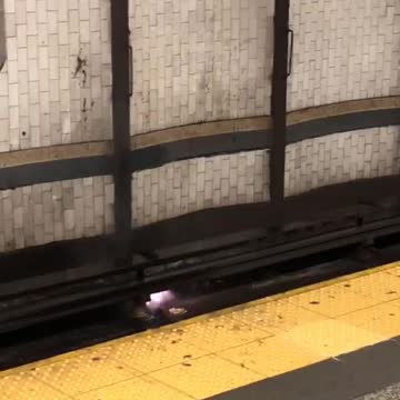 Putting out fire on subway tracks