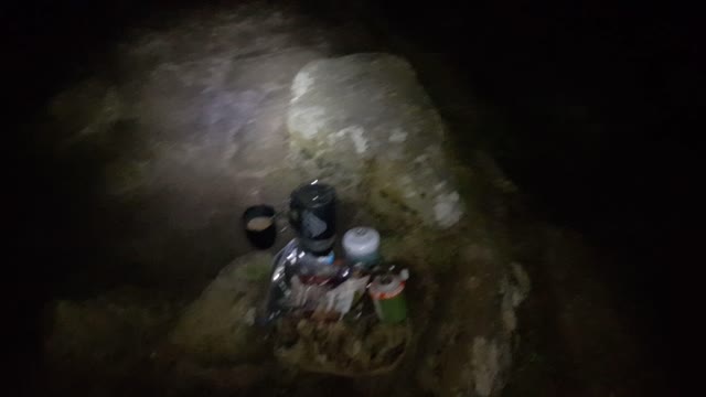 At hound tor At night heating up a Mre meal and about to do a vlog Dartmoor