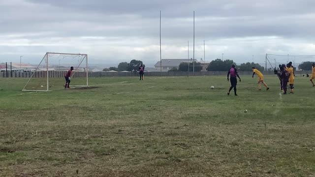 Gansbay Rovers vs. Salim United. Goal! Adam