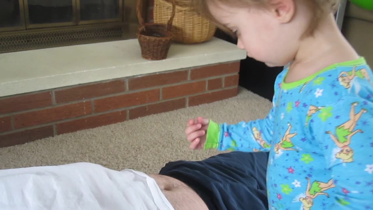 Lint Bunny Gets Pulled From Dad's Navel