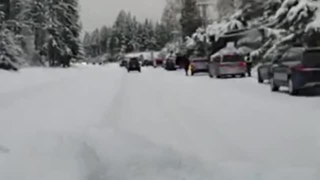 Vehicles Chaining up on the way to Timberline Lodge Mount Hood and Ski Bowl.