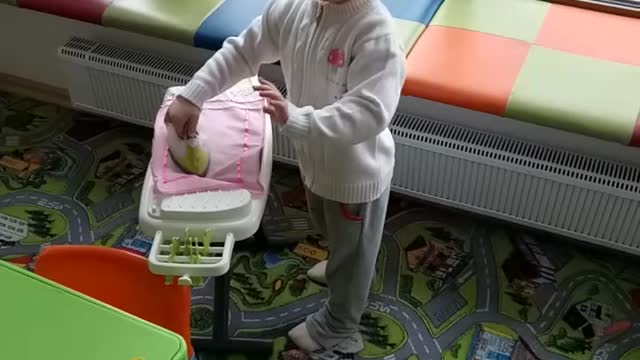 Little girl strokes linen