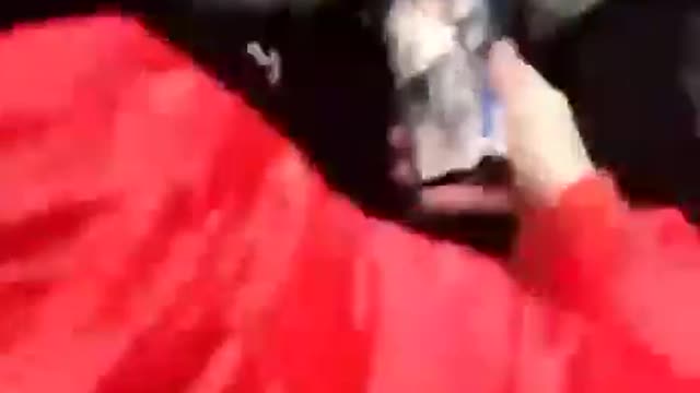 People go on streets and try to stop tanks
