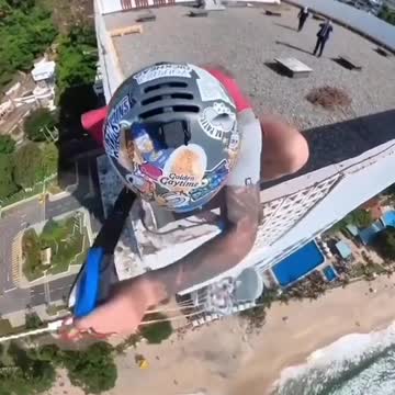 Skydiver Lands On The Wrong Building, Security Shows Up, But It's What He Does Next Makes Him Go Viral