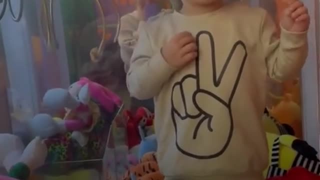 2-year-old 'very happy' as he finds way into claw machine