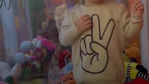 2-year-old 'very happy' as he finds way into claw machine