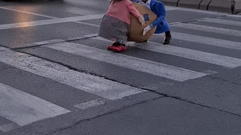 Man Crosses Street in Creative Costume