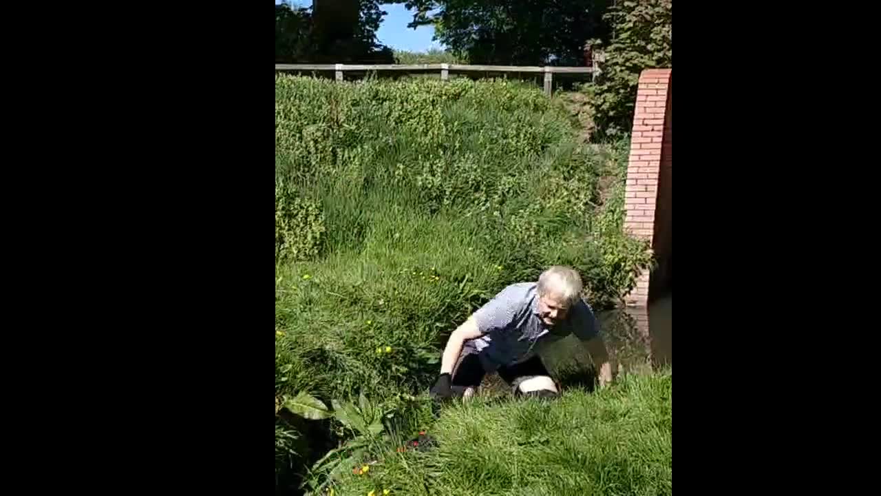 Man Trying to Jump Small Stream on Unicycle Prevails