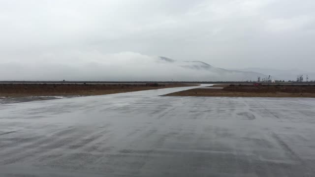 Lanchile takeoff in the wet