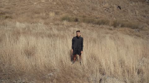 A man standing in the field